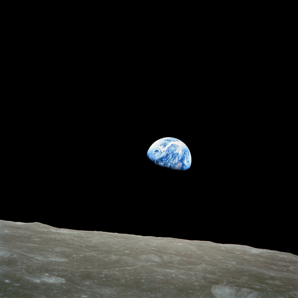 Public domain photo from NASA, showing the Earth rising, as seen from the moon.