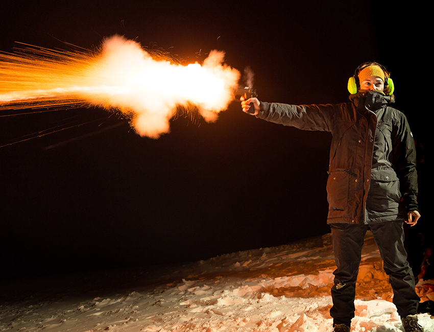 Someone shooting a flare pistol