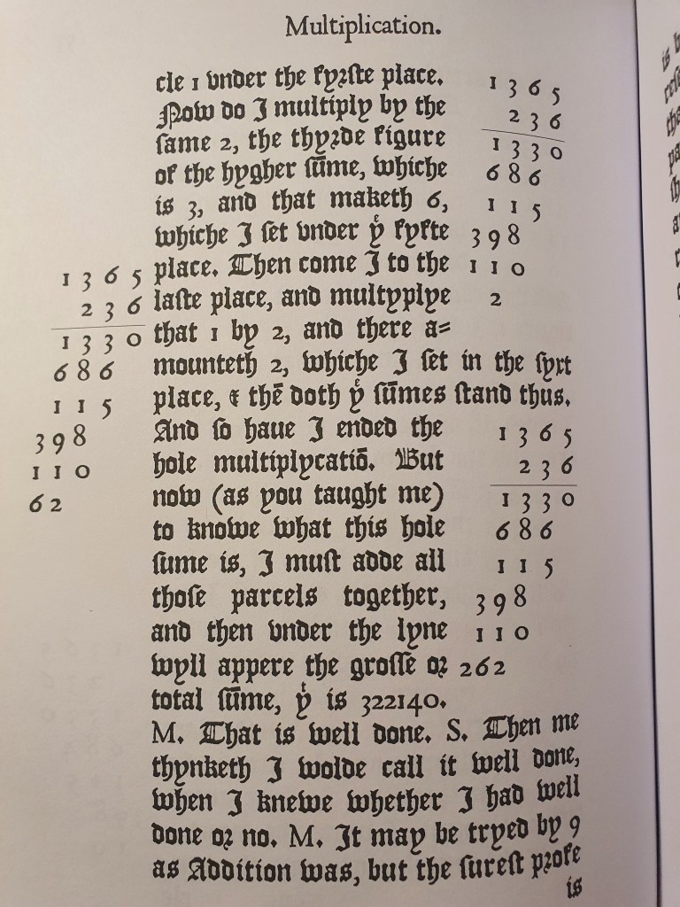 An extract of The Ground of Artes by Robert Recorde, showing modern long multiplication using Arabic numerals, plus lots of hard-to-read Tudor words